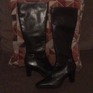 All black knee high boots with 3 inch block heel.